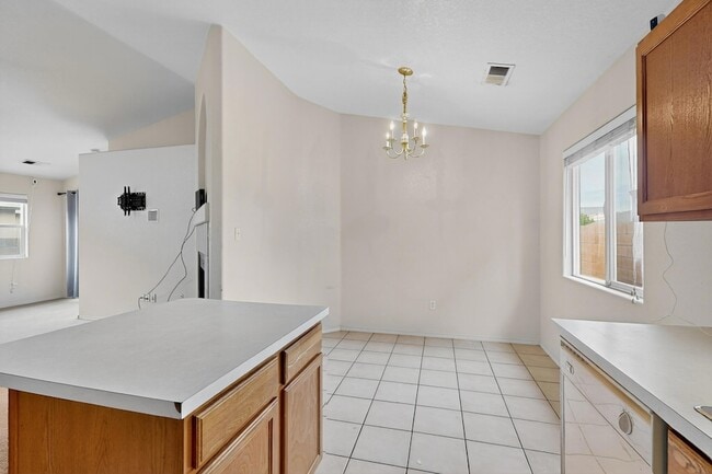 Building Photo - 9000 Violet Orchid Tr SW