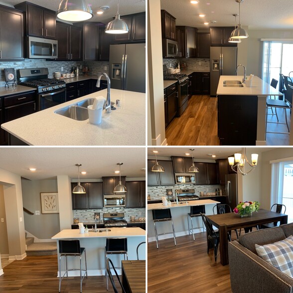 Kitchen contains GE Slate appliances (gas stove, dishwasher, side by side fridge, microwave). Dark cabinetry, ceramic backsplash, and Silestone quartz countertops make this kitchen a delight to cook in. (model home picture) - 4825 Martingale Drive