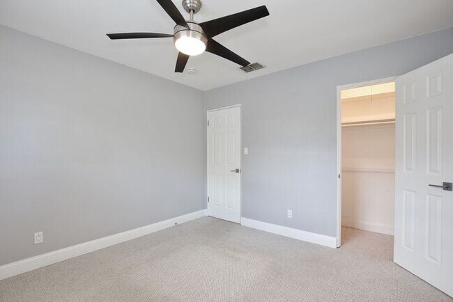 Building Photo - Gorgeous Waterfront 3/2 Mid-century Modern Style Home with a Covered Patio and a Large Backyard i...