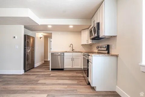 Kitchen with stainless steel appliances - 530 W 900 S