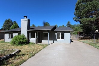 Building Photo - COMING AUGUST | 3-Bedroom Home in Bow & Arrow Acres | Large Yard + Wood-Burning Fireplace