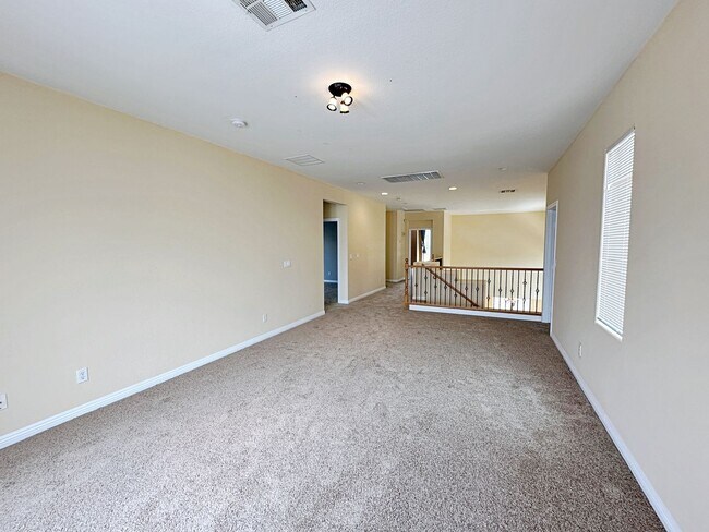 Building Photo - 4 BEDROOM HOME 3 CAR GARAGE ON A CORNER LO...