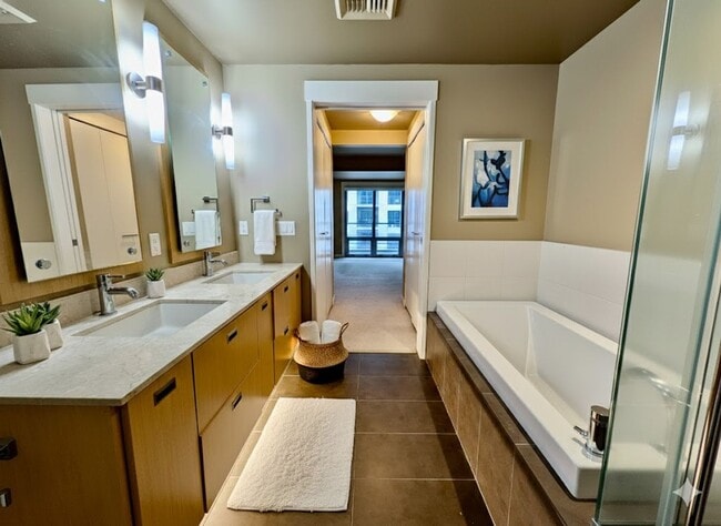 Building Photo - Exquisite Condominium at the Renowned Waterfront Pearl with Views of the River, Work Out Facility...