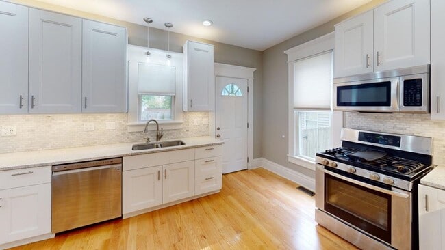 Primary Photo - 5 BEDROOMS + 2.5 BATHROOMS + 3 FREE OFF-ST...