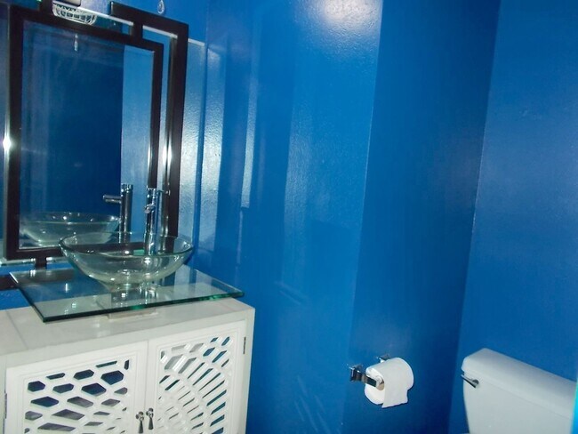 Building Photo - Two-story, 2-bedroom townhome ideally located in the heart of Boulder City