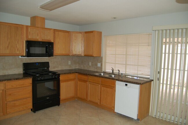 Building Photo - 7185 Acorn Ct
