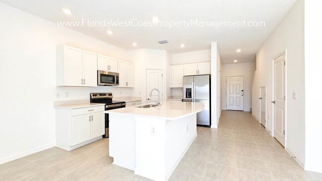 Building Photo - OUTSTANDING BRAND NEW TOWNHOME! SKYE RANCH...