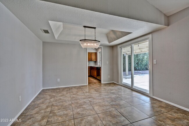 Building Photo - 6747 E Aire Libre Ln