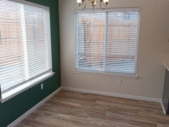 Building Photo - Spacious 4-bedroom, 2-bathroom home! Comin...