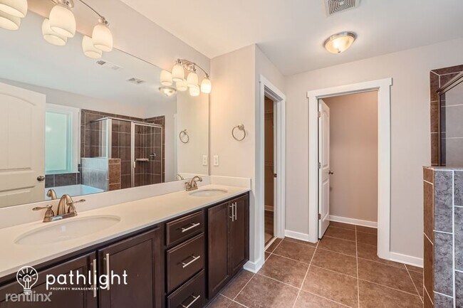 Building Photo - 5 br, 3 bath House - 2501 Wevok Way SE UNIT