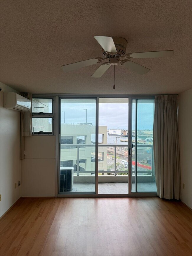 Building Photo - AC in Every Room. TWO Parking Stalls.