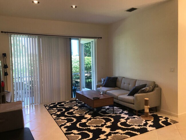 Building Photo - Rare Find! Gorgeous 3/2 villa with garage in Boca Pointe!