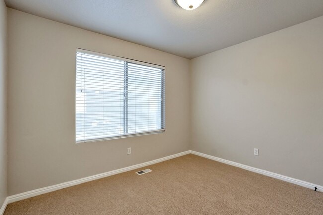 Building Photo - Pet Friendly Townhome w attached 2 car garage