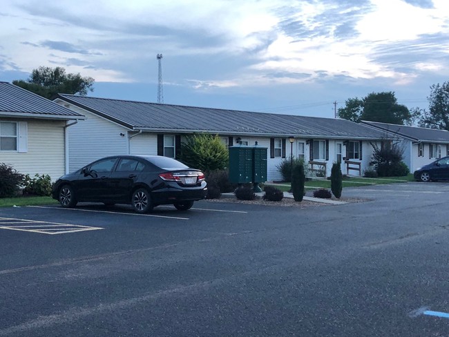 Parking in front of units, secured mailboxes on site - 109 N Plains Rd