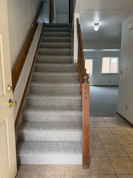 Entryway to living room & kitchen - 6734 Yarrow St
