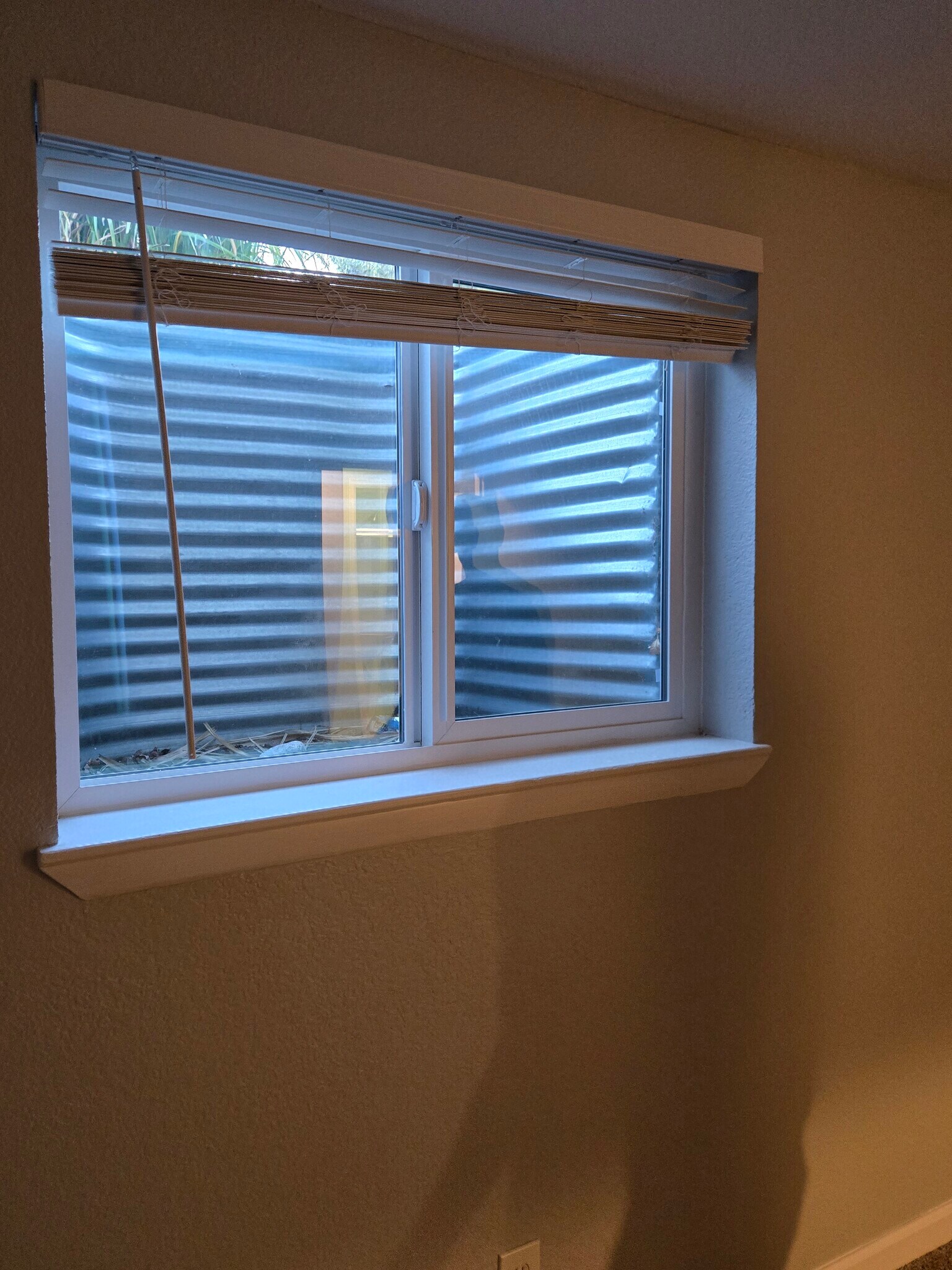 Bsmt bdrm egress - 8731 Field Way