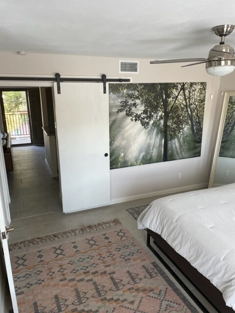 Barn doors installed on bedroom and closet. - 3131 Southwest Fwy