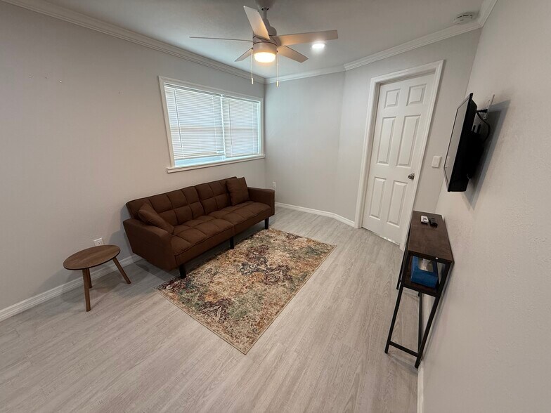 Living room with door to bedroom - 324 Clearwater Ave