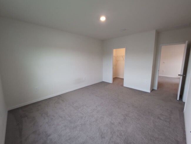 Building Photo - Fresh new build ~ 3 bed/ 2.5 bath Townhous...