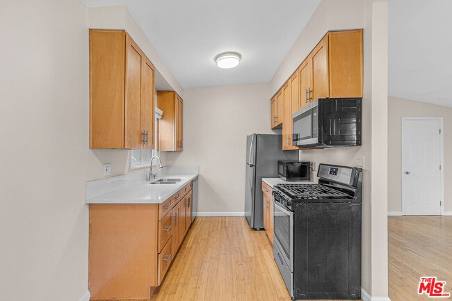 Building Photo - 12021 Louise Ave