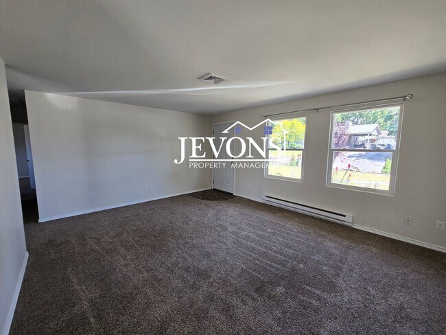Building Photo - $500 Rent Credit | Spacious 4-bedroom home...
