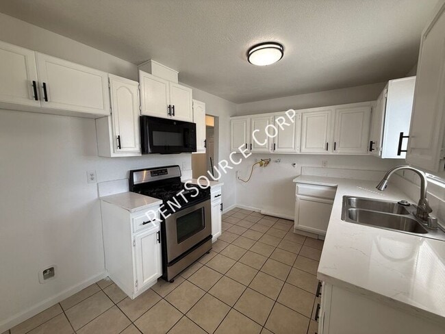 Building Photo - 4318 Ave L 2