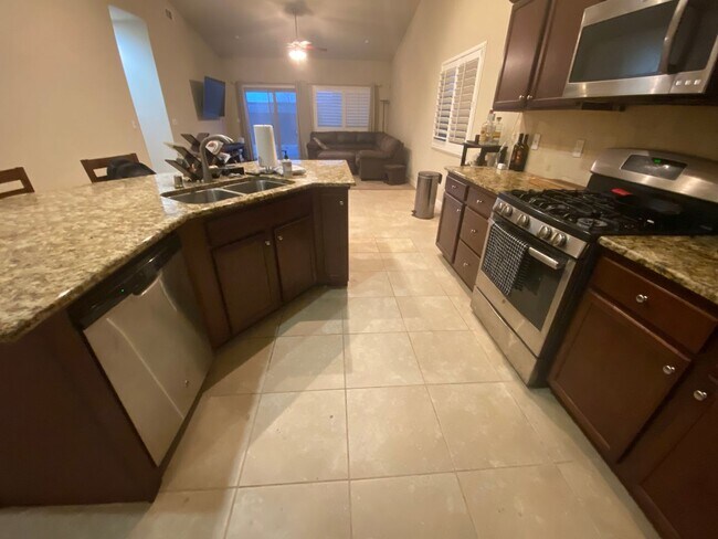 Building Photo - Move into Northwest Hanford and relax in your spa!