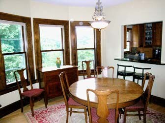 Dining area. This is part of a great room which includes the dining area and living room. From the kitchen you can see this whole space an out to the porch. - 2261 Scudder Street