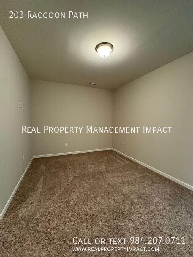 Building Photo - 203 Raccoon Path