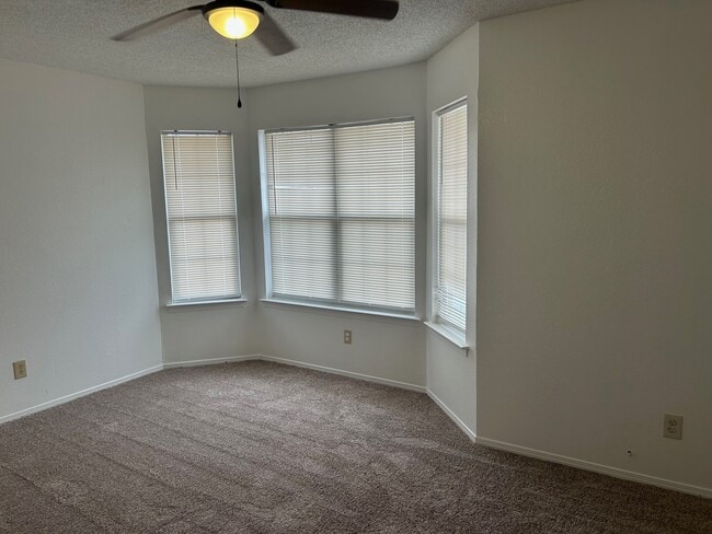 master bedroom with ceiling fan, new carpet and paint - 1345 Trudy Elaine Dr
