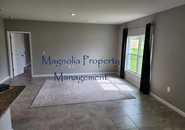 Building Photo - Magnolia Park - Haines City