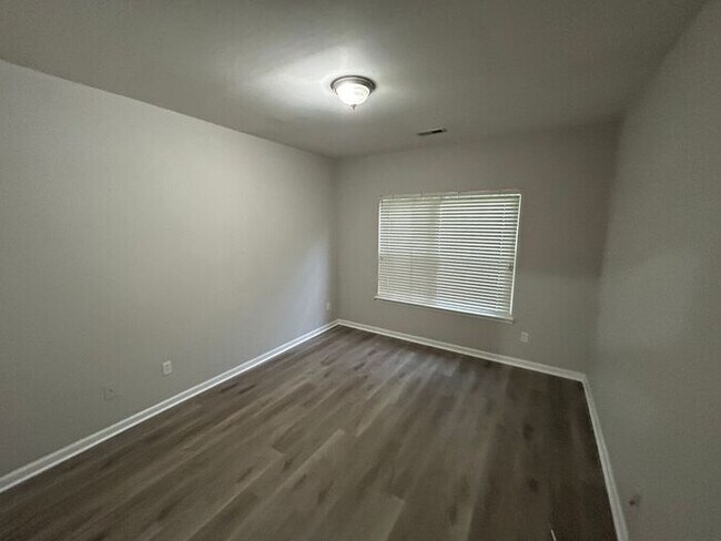 Building Photo - **Spacious 4-Bedroom Home with Walk-In Clo...