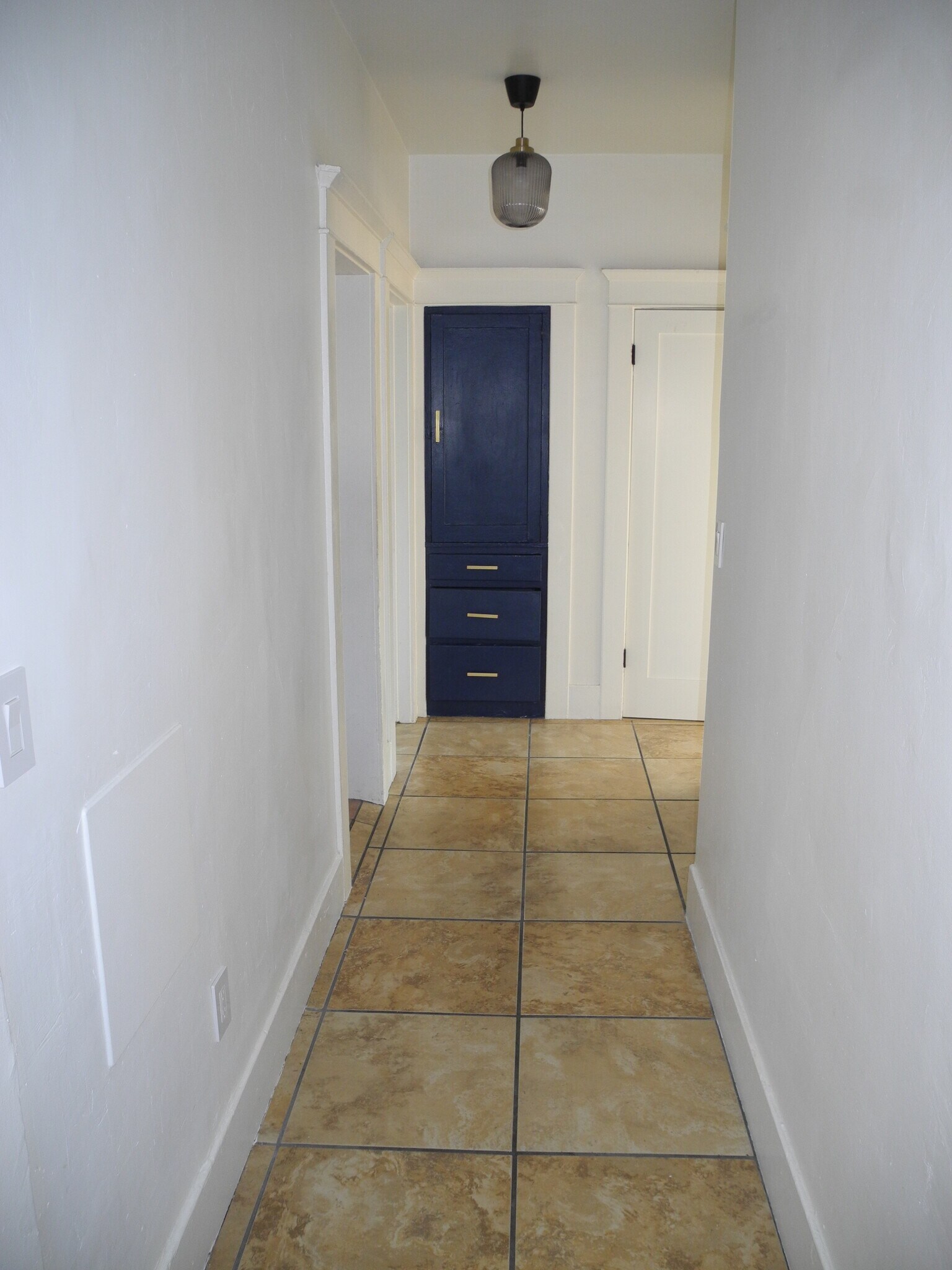 Hallway and living are tiled - 1934 Henderson Ave