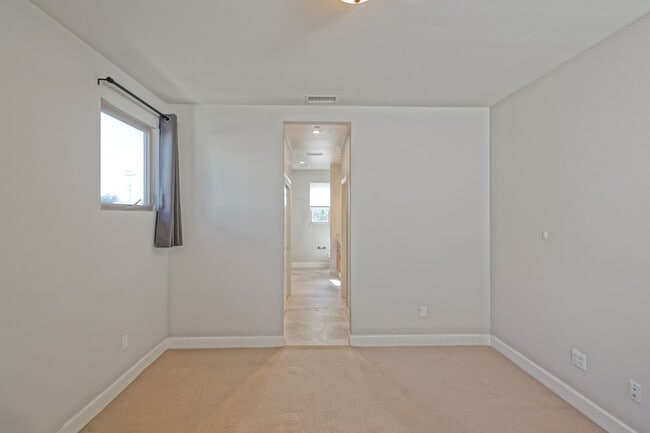 Building Photo - BUILT IN 2019: SPACIOUS & BRIGHT, DETACHED TOWNHOUSE W/ 2-CAR GARAGE & FENCED YARD IN GREAT RESID...