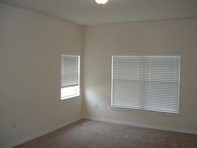 Building Photo - 3/2 House in the Gated Spring Lake Village Community with Water View