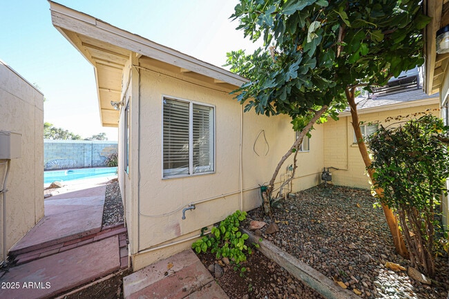 Building Photo - 3408 W Port Au Prince Ln