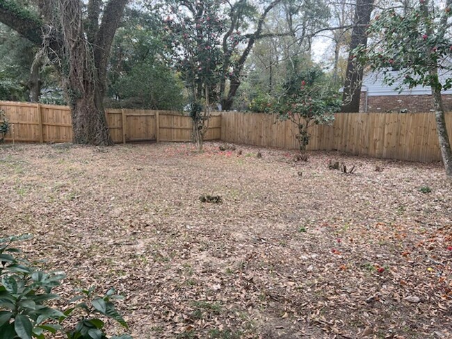 Building Photo - 2/2 with carport - fenced backyard