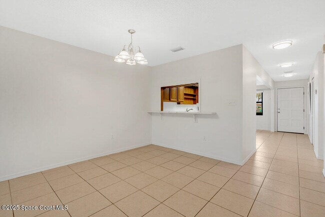 Building Photo - 5610 N Banana River Blvd