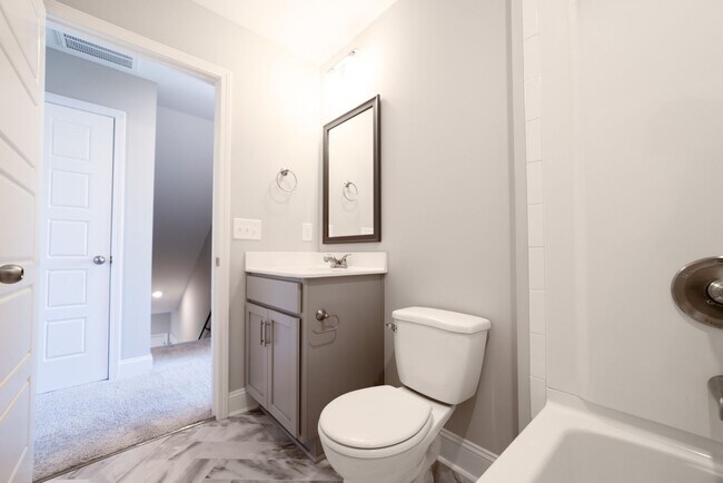 Building Photo - Elegant Home with Stone Fireplace, Kitchen Island and Designer Primary Suite