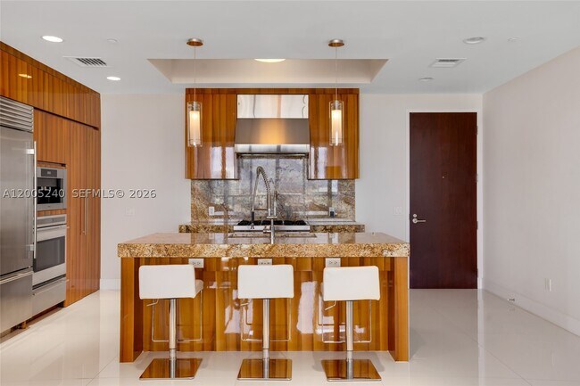 Building Photo - 9701 Collins Ave