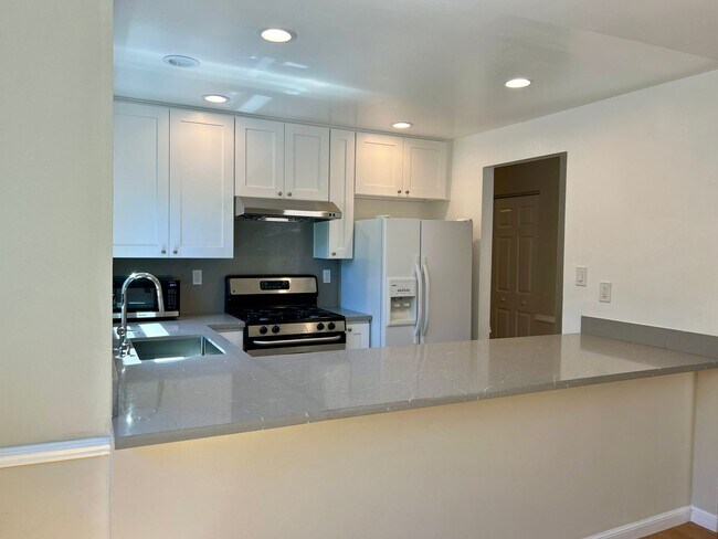 Building Photo - Great Natural light, Treetop Views with 2 Primary Suites plus OFFICE and a 2 car garage, It is li...