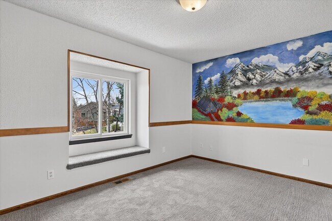 Building Photo - 4BR/4BA Updated Home with Finished Basement Suite & Landscaped Yard