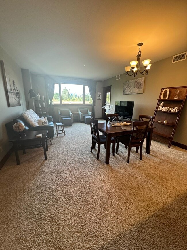 Building Photo - River Stone Condominium