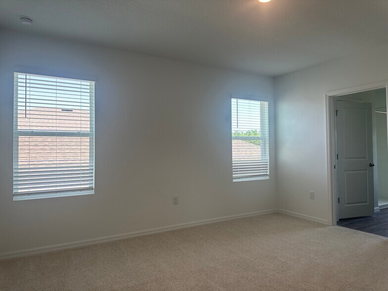 Primary bedroom - 10574 Dusty Boot Rd