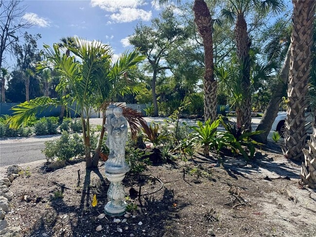 Building Photo - 7372 Melaleuca Way