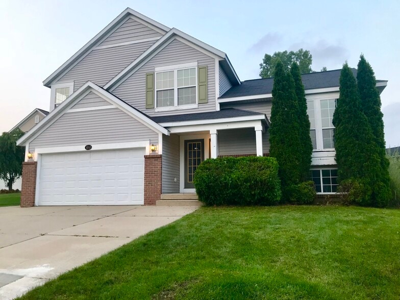 Beautiful Single Family home with wooded backyard in the most popular community in Kentwood, MI. - 3843 West De Blaay Ct SE