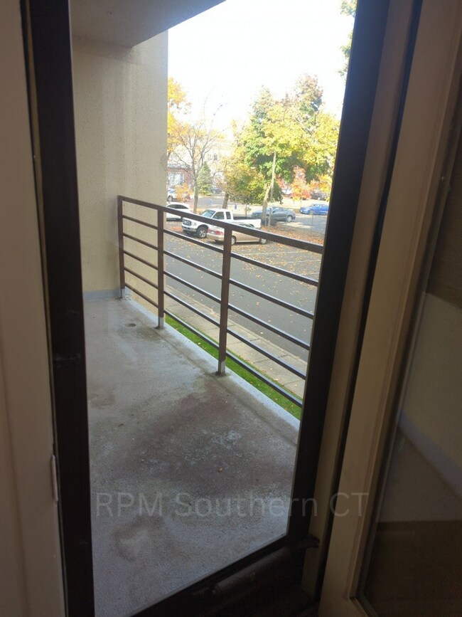 Building Photo - 1 Bedroom Condo | Whitneyville