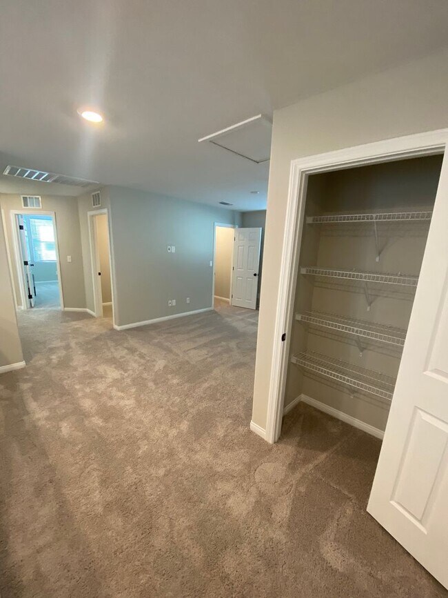 Building Photo - Americana Property Mgmt - 2022 built 4 bedrooms in prime South West Las Vegas