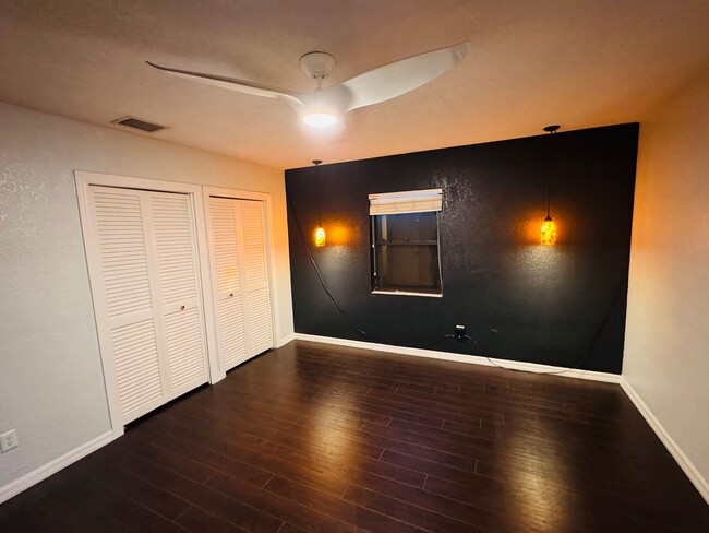 Building Photo - Elegant and Updated 3/2 Pool Home just min...