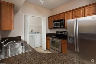 Building Photo - ANNUAL RENTAL - POSITANO PLACE 2 BED / 2 BATH